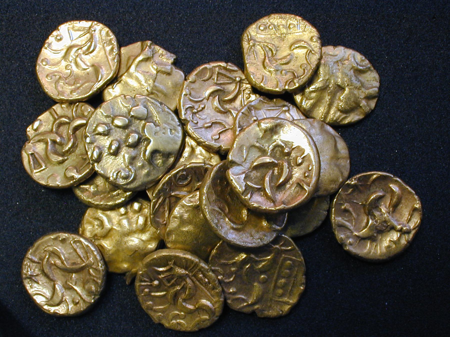 File:A hoard of Iron Age coins from Beverly.jpg - a pile of gold coins