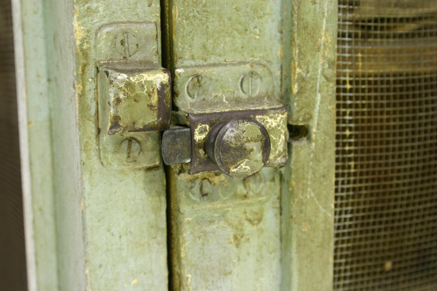 Food Safe - Old Lolly Shop, Carlton North, 1939-1990 - a close up of a door with a metal latch